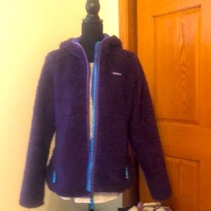 Patagonia lined jacket w/hood. Purple, very warm.  Only worn a few times